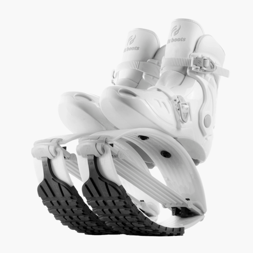 White ski boot with black cleats on a white background
